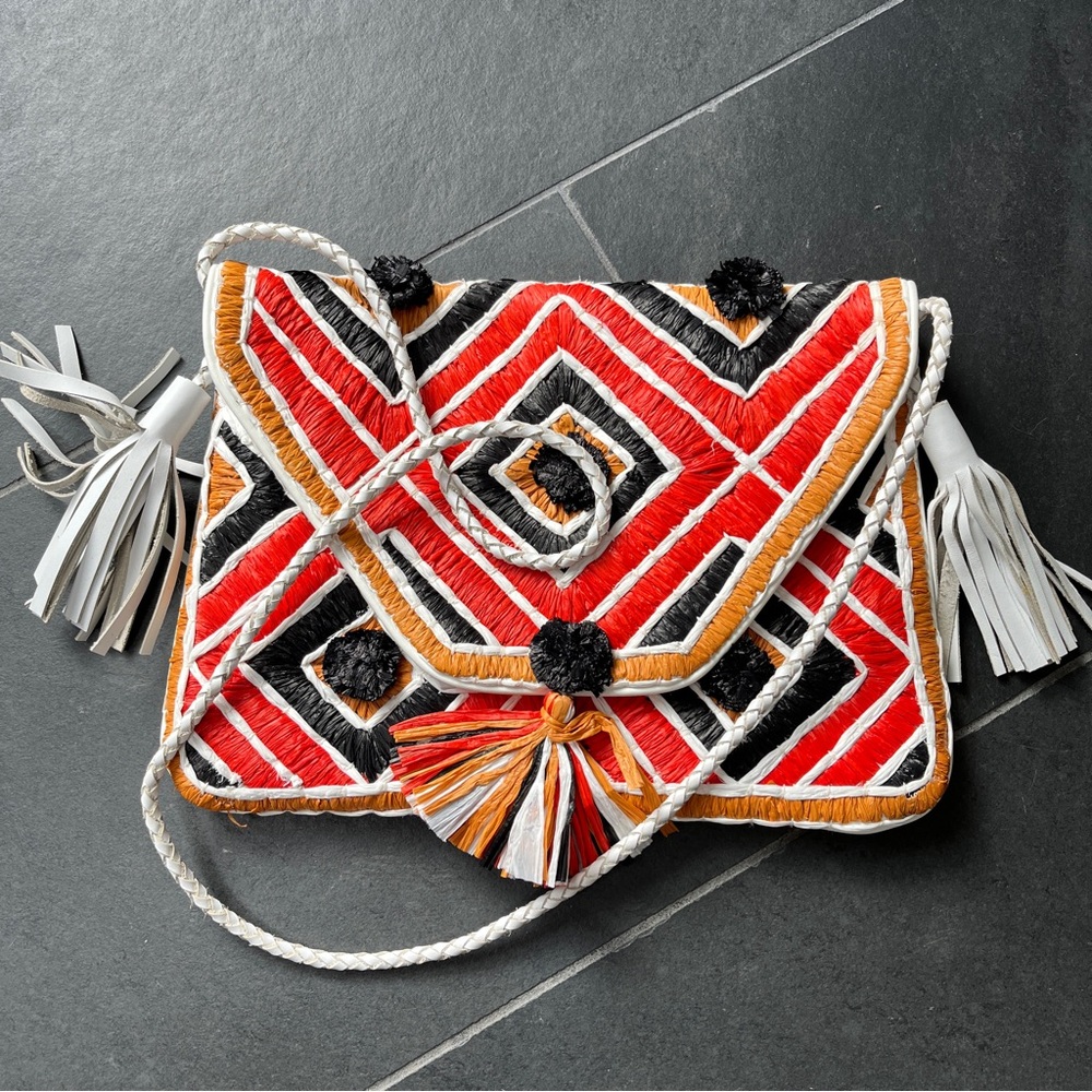 Anthropologie, ibBan crossbody boho style purse. Straw, cotton and leather.
